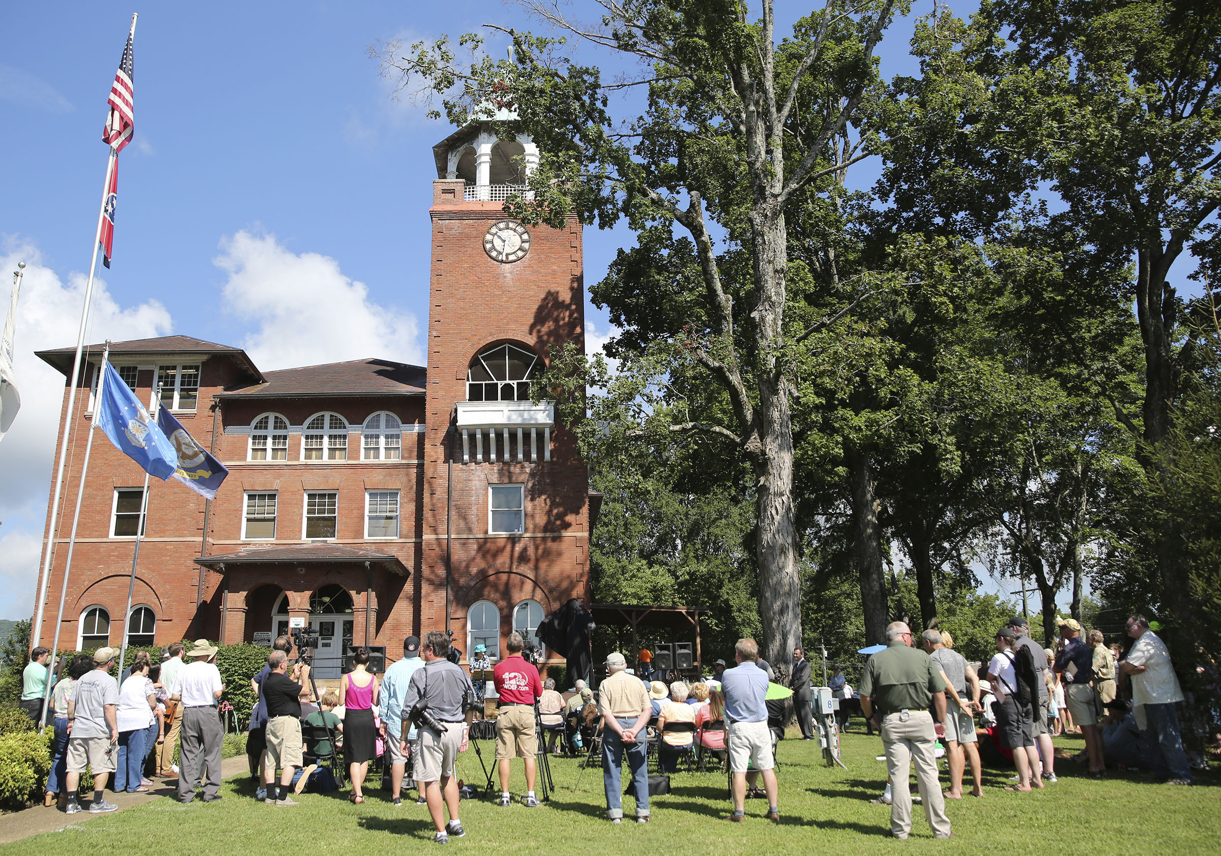 Attendees of the dedication and unveiling event of the Clarence Darrow Commemorative Statue fill the Rhea County Courthouse lawn Friday, July 14, 2017, in Dayton, Tennessee. William Jennings Bryan was honored by a statue being commissioned by Bryan College and created by Cessna Decosimo in 2005 for the Rhea County Courthouse, and Friday a statue was unveiled for Clarence Darrow.
