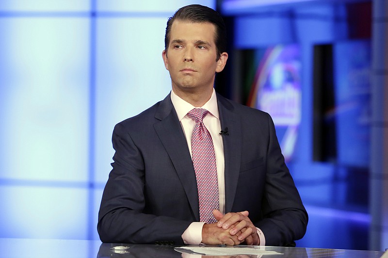 
              In this July 11, 2017, photo, Donald Trump Jr. is interviewed by host Sean Hannity on the Fox News Channel television program, in New York Trump’s eldest son, Donald Trump Jr., posted a series of email messages to Twitter on Tuesday showing him eagerly accepting help from what was described to him as a Russian government effort to aid his father's campaign with damaging information about Hillary Clinton. (AP Photo/Richard Drew)
            