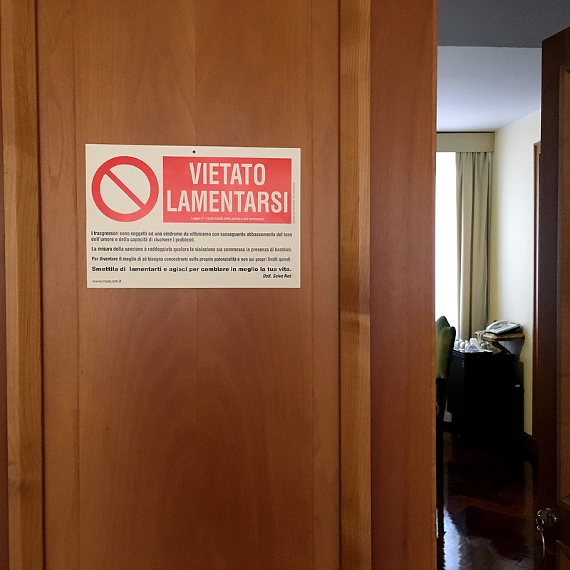 
              In this photo taken on Wednesday, July 12, 2017, a sign on the door of Pope Francis' room at the Vatican reads in Italian "No Whining". Pope Francis hasn't lost his sense of humor despite a rough few weeks of clamorous exits of top Vatican officials and some other negative headlines. He has hung a sign on the door of his hotel suite reading: "No Whining." In smaller print the sign continues: "Transgressors are subject to a syndrome of victimization and the ensuing reduction of a sense of humor and capacity to resolve problems. Sanctions are doubled when the violation is committed in the presence of children." (Vatican Insider - La Stampa via AP)
            