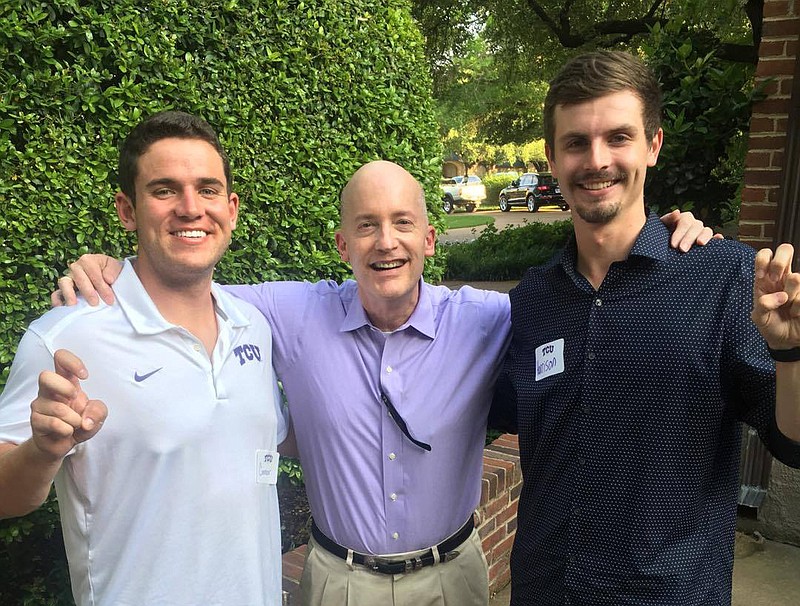 Harrison Smith, right, stands with Dr. Victor Boschini, chancellor of Texas Christian University, and friend Connor Vaccaro, left.