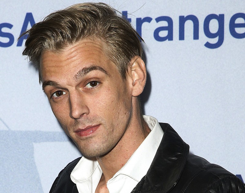 
              FILE - In this Nov. 9, 2015, file photo, singer Aaron Carter arrives at a premiere of "Saints & Strangers" at the Saban Theater in Beverly Hills, Calif. Authorities said Carter and his girlfriend Madison Parker were arrested Saturday, July 15, 2017, on DUI and drug charges in Georgia. (Photo by Rich Fury/Invision/AP, File)
            