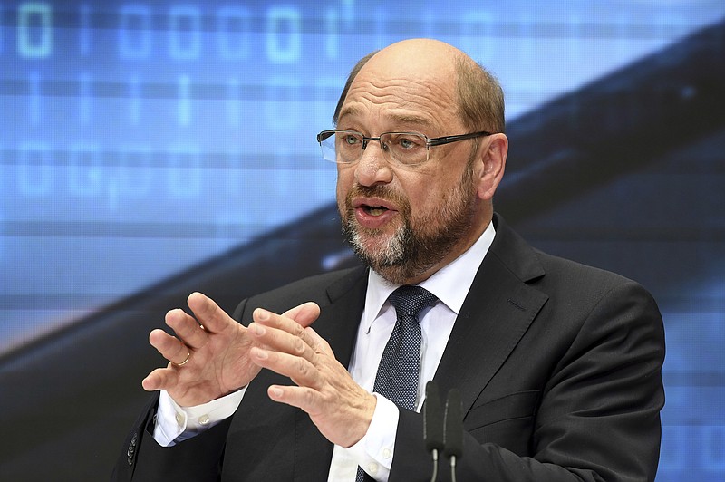 
              Candidate of the German Social Democrats, SPD, for the upcoming election Martin Schulz delivers a speech where he presented his plan for the future in Berlin, Germany, Sunday, July 16, 2017. Chancellor Angela Merkel’s challenger in Germany’s election Schulz is calling for the government to be obliged to invest more in infrastructure such as roads, railways and schools. (Maurizio Gambarini/dpa via AP)
            