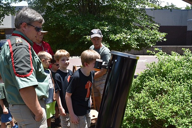 While at Fall Creek Falls, the Hixson Presbyterian Church Trail Life Troop got to take turns looking through a special telescope to safely observe the sun. (Contributed Photo)