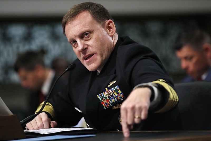 
              FILE - In this May 9, 2017, file photo, U.S. Cyber Command and the National Security Agency Director Adm. Mike Rogers testifies on Capitol Hill in Washington. U.S. officials say the Trump administration, after months of delay, is finalizing plans to revamp the nation's military command for defensive and offensive cyber-operations. The plan would eventually split it from the intelligence-focused National Security Agency in hopes of intensifying America's ability to wage cyber war against the Islamic State group and other foes. (AP Photo/Jacquelyn Martin, File)
            