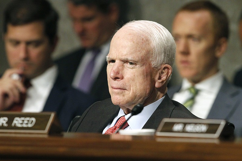  In this July 11, 2017 file photo, Senate Armed Services Committee Chairman Sen. John McCain, R-Ariz. listens on Capitol Hill in Washington, during the committee's confirmation hearing for Nay Secretary nominee Richard Spencer. Surgeons in Phoenix said they removed a blood clot from above the left eye of McCain. Mayo Clinic Hospital doctors said Saturday, July 15 that McCain underwent a "minimally invasive" procedure to remove the nearly 2-inch (5-centimeter) clot, and that the surgery went "very well." They said the 80-year-old Republican is resting comfortably at his home in Arizona. Pathology reports are expected in the next several days. (AP Photo/Jacquelyn Martin, File)