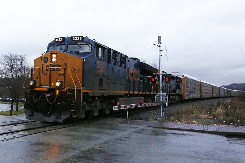 
              In this Thursday, Jan. 26, 2017, photo, a CSX freight train passes through Homestead, Pa. CSX Corp. reports financial results, Tuesday, July 18, 2017. (AP Photo/Gene J. Puskar)
            