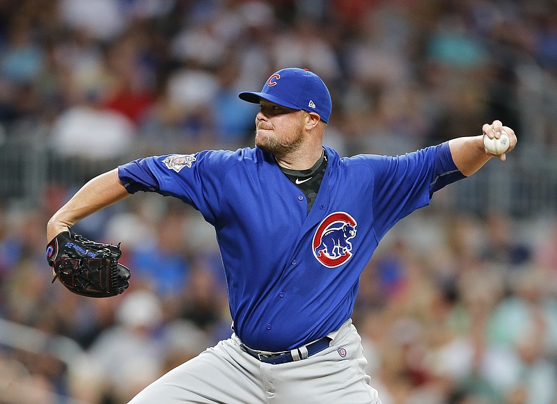 Chicago Cubs starting pitcher Jon Lester works during the first inning of the team's baseball game against the Atlanta Braves on Monday, July 17, 2017, in Atlanta. (AP Photo/John Bazemore)