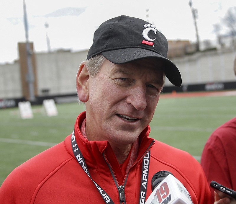 
              FILE - In this April 2, 2016, file photo, then-Cincinnati head coach Tommy Tuberville speaks to the media after their spring NCAA college football game, in Cincinnati. Former Auburn and Cincinnati coach Tommy Tuberville is joining ESPN for the upcoming season as a game analyst. ESPN announced Wednesday, July 19, 2017,  that Tuberville will call games each week and a play-by-play partner will be named soon. (AP Photo/John Minchillo, File)
            