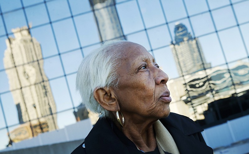 FILE - In this Jan. 11, 2016 file photo, Doris Payne poses for a photo in Atlanta. Police near Atlanta say a notorious jewel thief with an illicit career spanning six decades has been caught stealing again, but she wasn't after sparkly gems this time. A report from Chamblee police says 86-year-old Payne was arrested at a Walmart store around 5 p.m. Monday, July 17, 2017, and charged with misdemeanor theft by shoplifting. (AP Photo/John Bazemore, File)