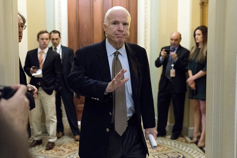 
              FILE - In this June 22, 2017, file photo Sen. John McCain, R-Ariz., arrives for a Senate Republican meeting on a health reform bill on Capitol Hill in Washington. McCain has been diagnosed with a brain tumor after doctors removed a blood clot above his left eye last week, his office said in a statement July 19. (AP Photo/Andrew Harnik, File)
            