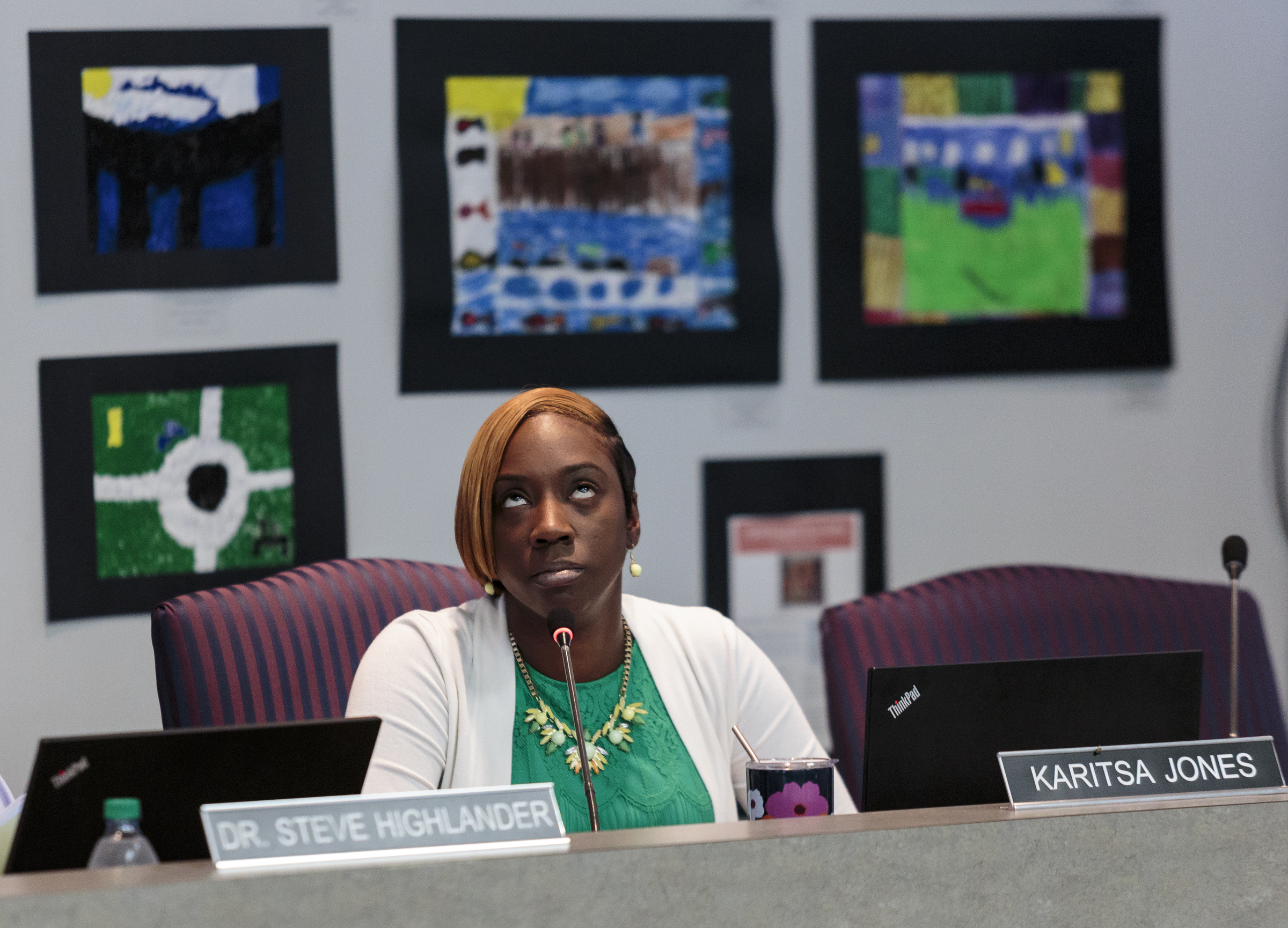 School board member Karitsa Jones listens to a board discussion about a school Partnership Zone proposal during a Hamilton County Board of Education meeting on Thursday, July 20, 2017, in Chattanooga, Tenn. The school Partnership Zone would create an independent mini-district within Hamilton County as an alternative to complete state takeover of five low-performing schools.