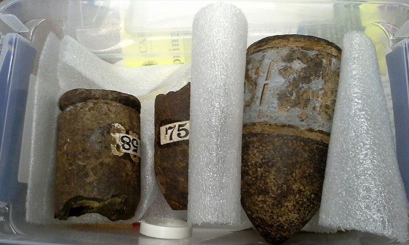 
              This photo provided by the Carlisle Police Department shows Civil War-era artillery shells that were discovered by a librarian at the Gleason Public Library in Carlisle, Mass., on Thursday, July 20, 2017. (Carlisle Police Department via AP)
            