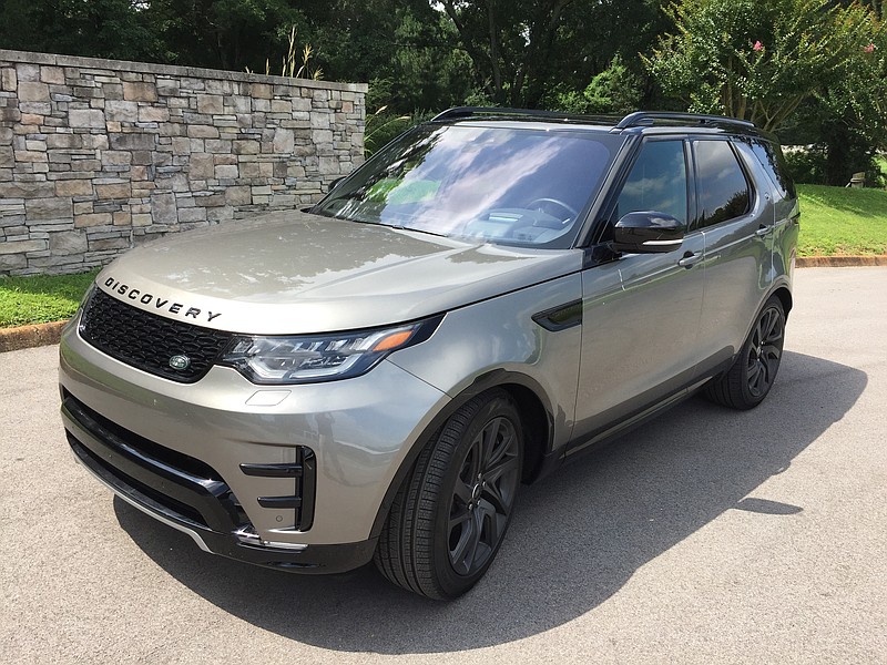 The 2017 Land Rover Discovery is shown in Silicon Silver paint with 22-inch satin gray wheels. 