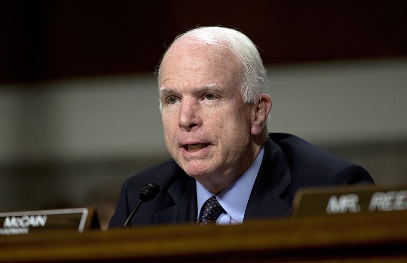 
              FILE - In this June 7, 2015, photo, Senate Armed Services Committee Chairman Sen. John McCain, R-Ariz., speaks during the Senate Armed Services Committee hearing on Capitol Hill in Washington. Arizona State Sen. Kelli Ward, who tried to oust McCain last year, is suggesting that he resign because he's been diagnosed with an aggressive form of brain cancer, Friday, July 21, 2017. (AP Photo/Carolyn Kaster, File)
            