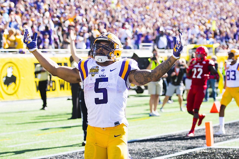 LSU junior running back Derrius Guice celebrates one of his two touchdowns in the 29-9 thumping of Louisville in last season's Citrus Bowl.