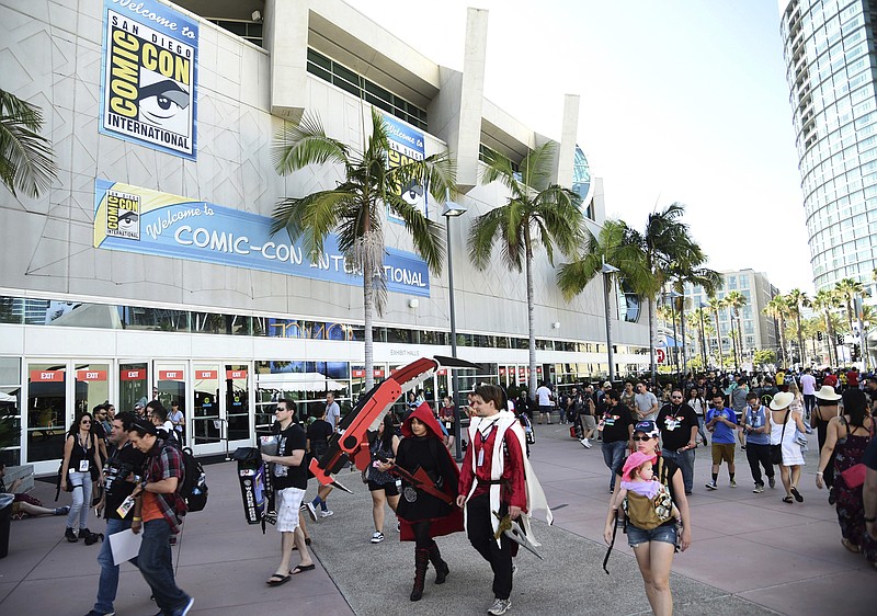 
              Guests attend day one of Comic-Con International on Thursday, July 20, 2017, in San Diego. (Photo by Al Powers/Invision/AP)
            