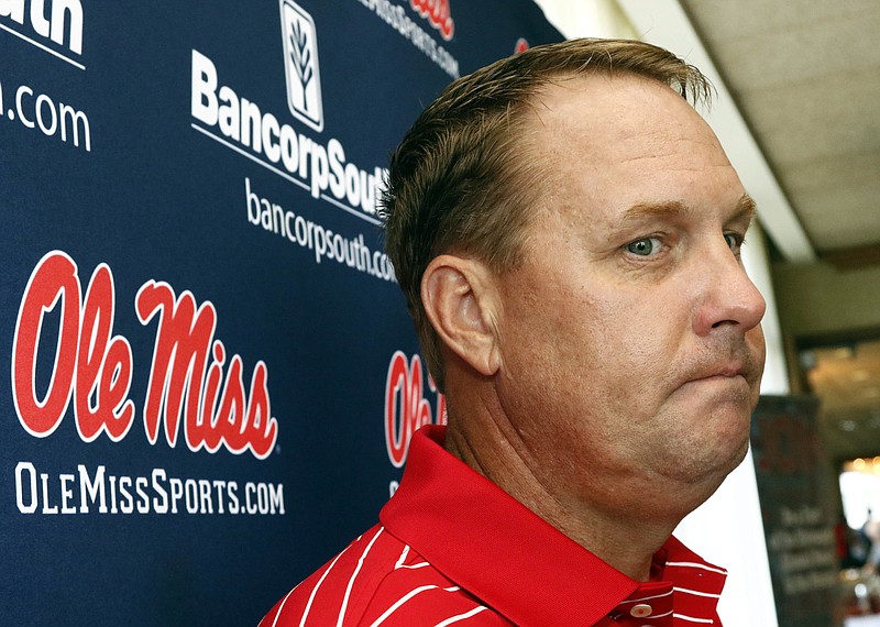 
              In this Tuesday, July 18, 2017 photo, Mississippi football coach Hugh Freeze considers a response to a question as he speaks to reporters during a Rebel Road Trip to visit with alumni and athletic supporters in Jackson, Miss. Mississippi announced Thursday, July 20, that Freeze resigned after five seasons, bringing a stunning end to a once-promising tenure. Offensive line coach Matt Luke has been named interim coach. (AP Photo/Rogelio V. Solis)
            