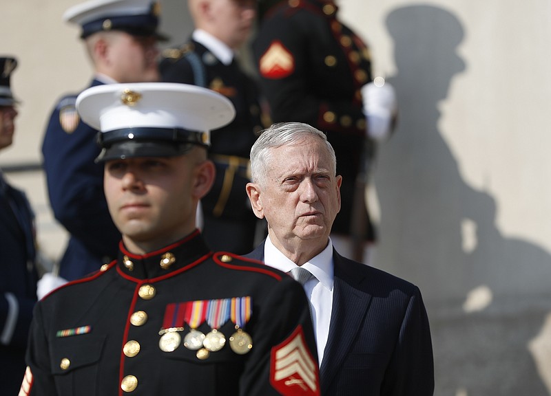 
              FILE - In this July 10, 2017, file photo, Defense Secretary Jim Mattis waits before an honor cordon at the Pentagon. The Trump administration is still sorting out “the big ideas” for a new Afghanistan strategy, beyond troop levels and other military details, Defense Secretary Jim Mattis said Friday, July 21, 2017.  (AP Photo/Pablo Martinez Monsivais, File)
            