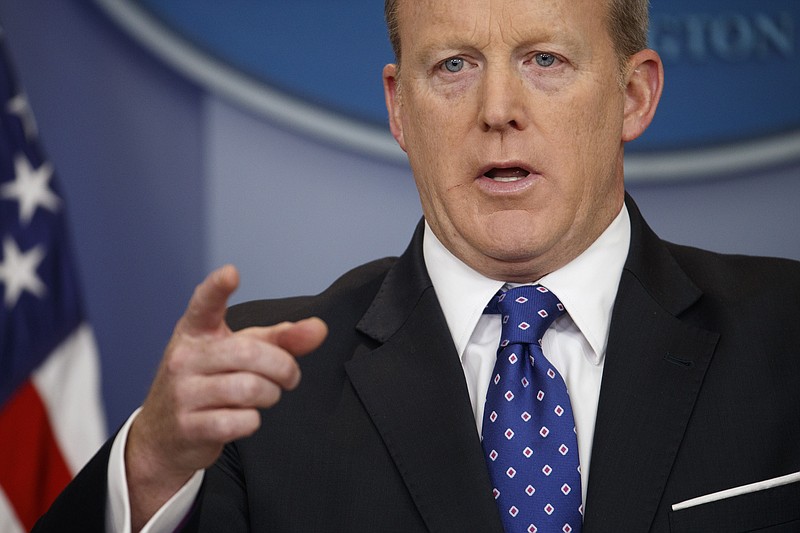 
              FILE - In this May 9, 2017, file photo, White House press secretary Sean Spicer speaks during the daily press briefing at the White House in Washington.  White House Press Secretary Sean Spicer has resigned over hiring of new communications aide.   (AP Photo/Evan Vucci, File)
            