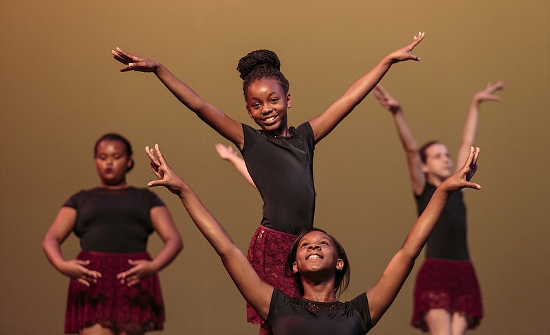 Dancers perform during a Dance Alive recital at the University of Tennessee at Chattanooga Fine Arts Center on Friday, July 21, 2017, in Chattanooga, Tenn. Children selected from auditions at ten Chattanooga recreation centers to take ballet and modern dance lessons from Ballet Tennessee performed at the recital.