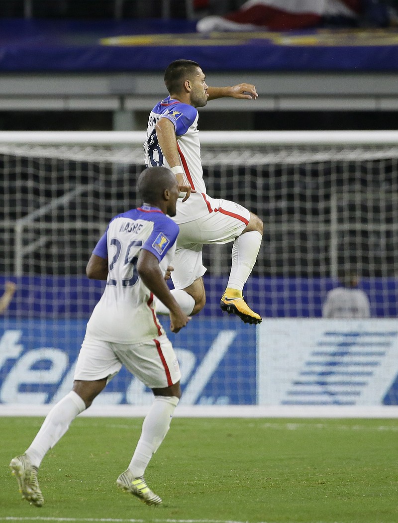 
              United States' Clint Dempsey, top, celebrates after scoring a goal against Costa Rica during a CONCACAF Gold Cup semifinal soccer match in Arlington, Texas, Saturday, July 22, 2017. (AP Photo/LM Otero)
            
