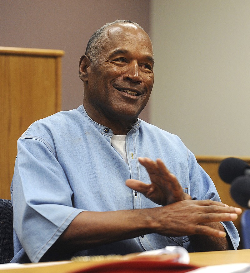 
              Former NFL football star O.J. Simpson attends his parole hearing at the Lovelock Correctional Center in Lovelock, Nev., on Thursday, July 20, 2017. Simpson was granted parole Thursday after more than eight years in prison for a Las Vegas hotel heist, successfully making his case in a nationally televised hearing that reflected America's enduring fascination with the former football star. (Jason Bean/The Reno Gazette-Journal via AP, Pool)
            