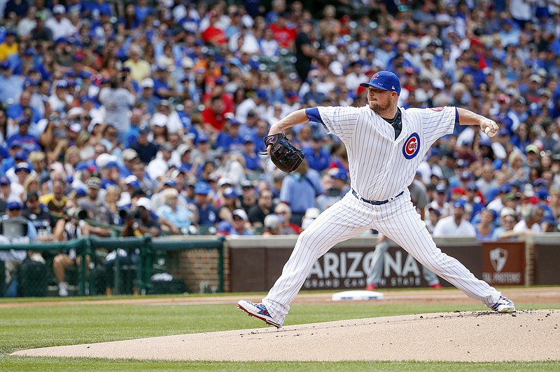 
              Chicago Cubs starting pitcher Jon Lester delivers against the St. Louis Cardinals during the first inning of a baseball game, Saturday, July 22, 2017, in Chicago. (AP Photo/Kamil Krzaczynski)
            