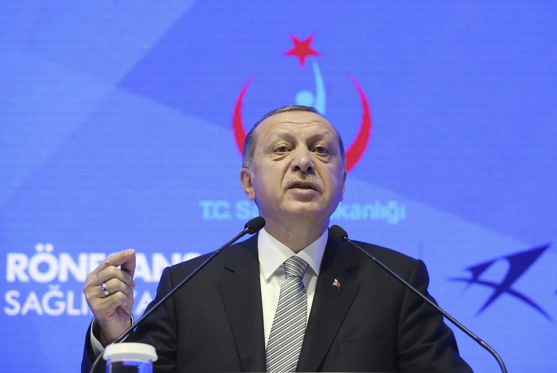 
              Turkey's President Recep Tayyip Erdogan speaks during a meeting in Istanbul, Friday, July 21, 2017. Erdogan has accused Germany's government of trying to scare off investments to Turkey with lies, after Germany toughened its stance toward Ankara following the arrest of human rights activists, including a German national.(Presidential Press Service/Pool photo via AP)
            