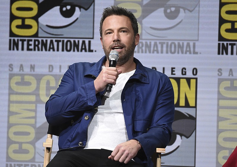 
              Ben Affleck speaks at the Warner Bros. "Justice League" panel on day three of Comic-Con International on Saturday, July 22, 2017, in San Diego. (Photo by Richard Shotwell/Invision/AP)
            