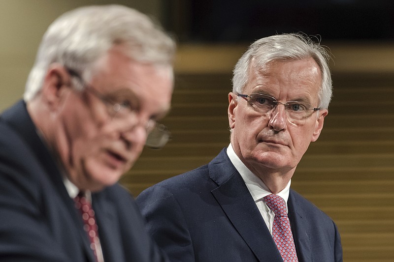 
              FILE - In this Thursday July 20, 2017 file photo, EU chief Brexit negotiator Michel Barnier, right, and British Secretary of State David Davis address the media after a week of negotiations at EU headquarters in Brussels. Since the June 8 British election, there has been a disunited British government, and an increasingly impatient EU. Officials of the bloc have slammed British proposals so far as vague and inadequate. There's also a fight looming over the multibillion-euro bill Britain must pay to meet previous commitments it made as an EU member. British Foreign Secretary Boris Johnson blustered recently that the bloc could "go whistle" if it thought Britain would settle a big exit tab. EU chief negotiator Michel Barnier replied: "I am mot hearing any whistling. Just the clock ticking."(AP Photo/Geert Vanden Wijngaert, file)
            