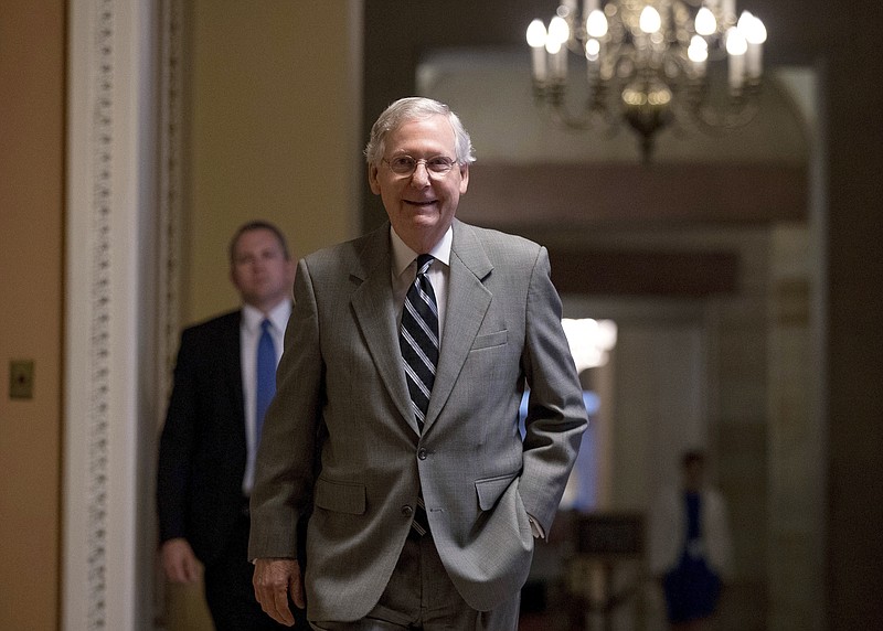 In this July 20, 2017, photo, Senate Majority Leader Mitch McConnell of Ky. walks into the Senate Chamber at the Capitol in Washington. A brutal reality is settling over Capitol Hill: The Republican effort to repeal and replace "Obamacare," which has consumed the first six months of the Trump administration, may never yield results. Not only that, the GOP goal of overhauling the tax code requires passing a budget that is months overdue. (AP Photo/Andrew Harnik)