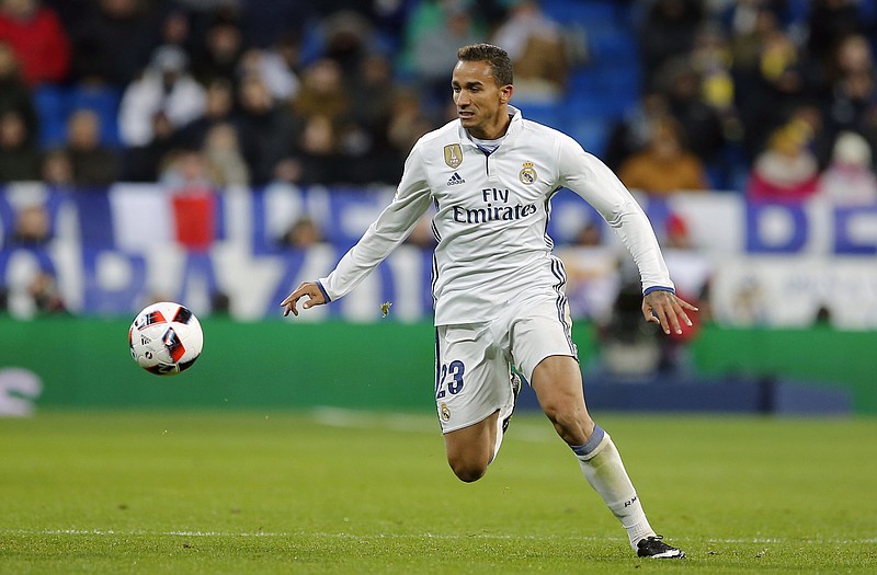 
              FILE - In this file photo dated Wednesday Jan. 18, 2017, Real Madrid's Danilo controls the ball during a Copa del Rey, quarter final, 1st leg soccer match between Real Madrid and Celta at the Santiago Bernabeu stadium in Madrid, Spain. Manchester City has signed Brazilian defender Danilo from Real Madrid on a five-year contract, Sunday July 23, 2017, fulfilling his ambition to play under Pep Guardiola after signing for the English Premier League club. (AP Photo/Paul White, FILE)
            
