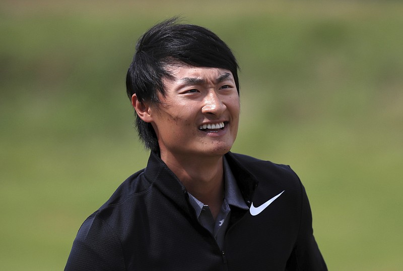 
              China's Li Haotong celebrates on the 18th during the final round of the British Open Golf Championship, at Royal Birkdale, Southport, England, Sunday July 23, 2017. (Peter Byrne/PA via AP)
            