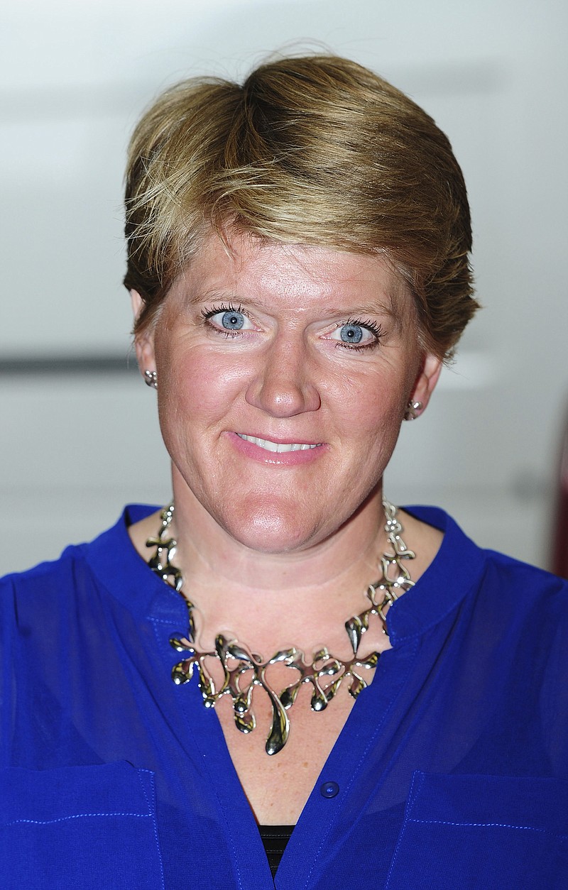 
              FILE - In this file photo dated June 10, 2013, Broadcaster and journalist Clare Balding poses for a photo in London. Several prominent women at the BBC, including Balding have written an open letter Sunday July 23, 2017,  to BBC Director-General Tony Hall saying documents released last week confirmed that "women at the BBC are being paid less than men for the same work."  and said they want the broadcaster's gender pay gap to be resolved now rather than in several years. (Ian West/PA FILE via AP)
            