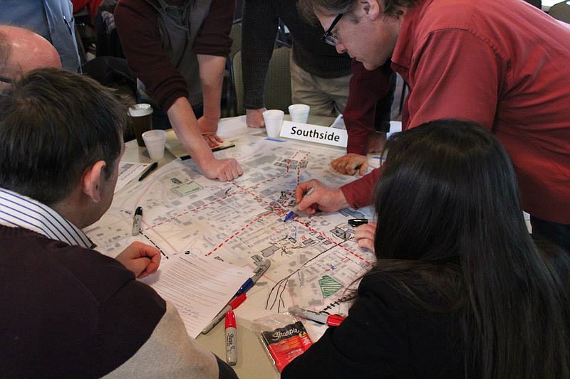 Southside residents examine an area map during a past meeting led by RPA officials. Residents in the White Oak Mountain Area have a similar chance to give feedback during two upcoming meetings. (Contributed photo)