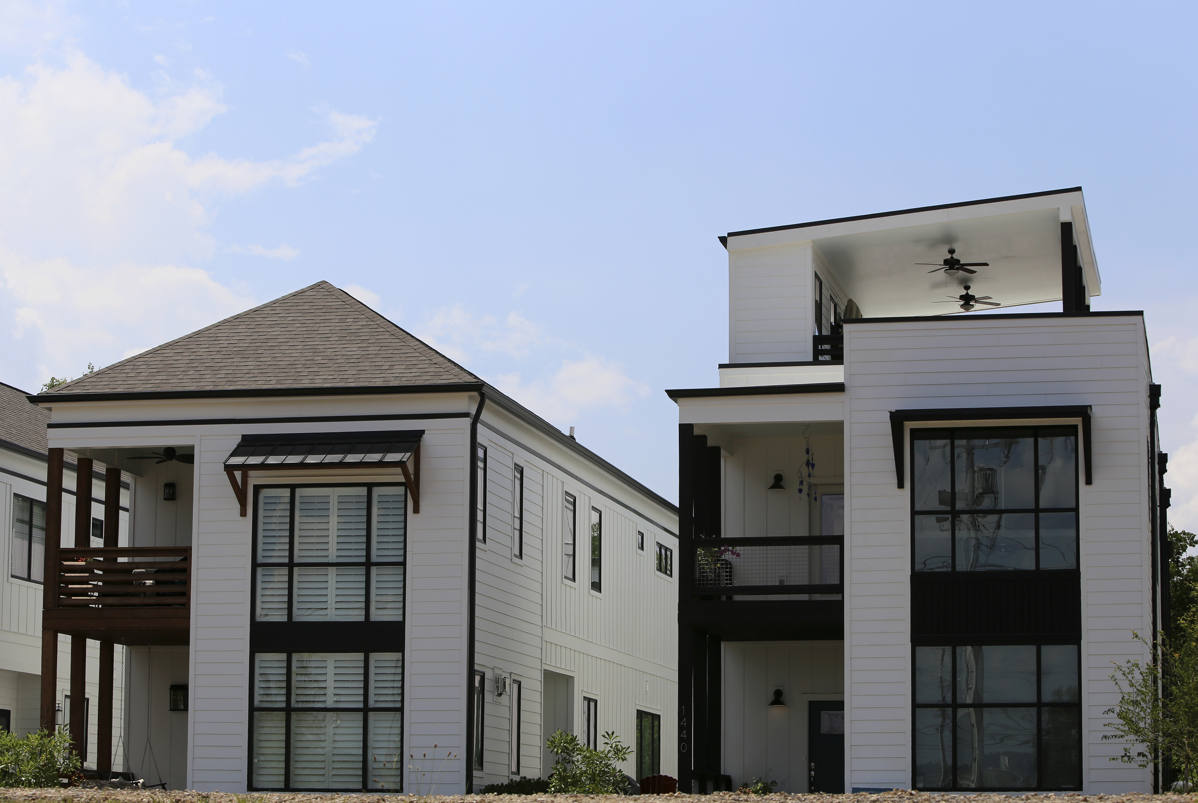 A private rooftop terrace is seen at One Hundred at South Broad on Wednesday, July 12, in Chattanooga, Tenn. The rooflines of the neighboring homes help make the open-air terrace private.