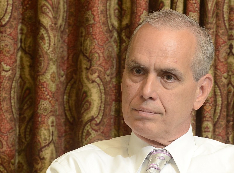 Donnie Hutcherson is photographed during an interview at the offices of the Henderson Hutcherson and McCullough accounting firm, located in the former Freight Depot building in downtown Chattanooga. 