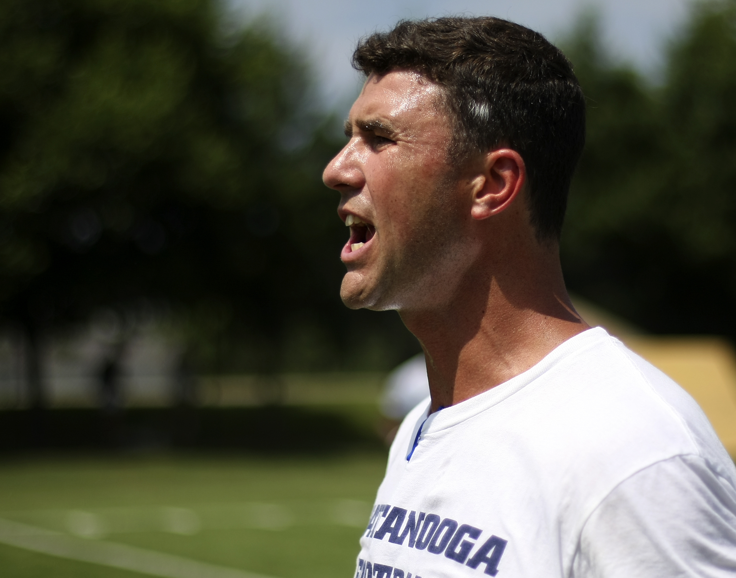UTC head coach Tom Arth yells to his players during the first day of fall practice at Scrappy Moore Field on Monday, July 24, in Chattanooga, Tenn.