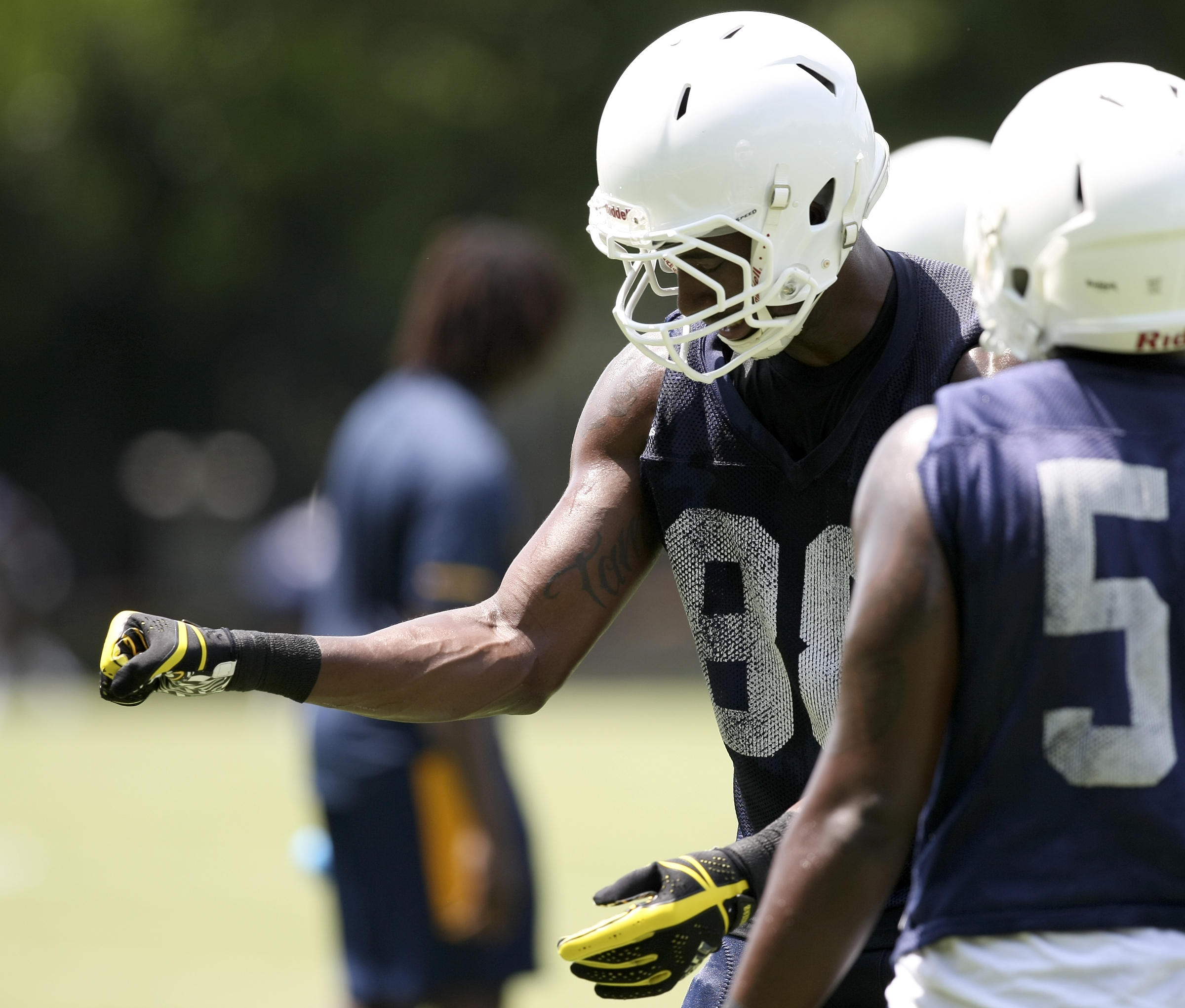 UTC defensive lineman Joshua Phillips (88) dances during the first day of fall practice at Scrappy Moore Field on Monday, July 24, in Chattanooga, Tenn.
