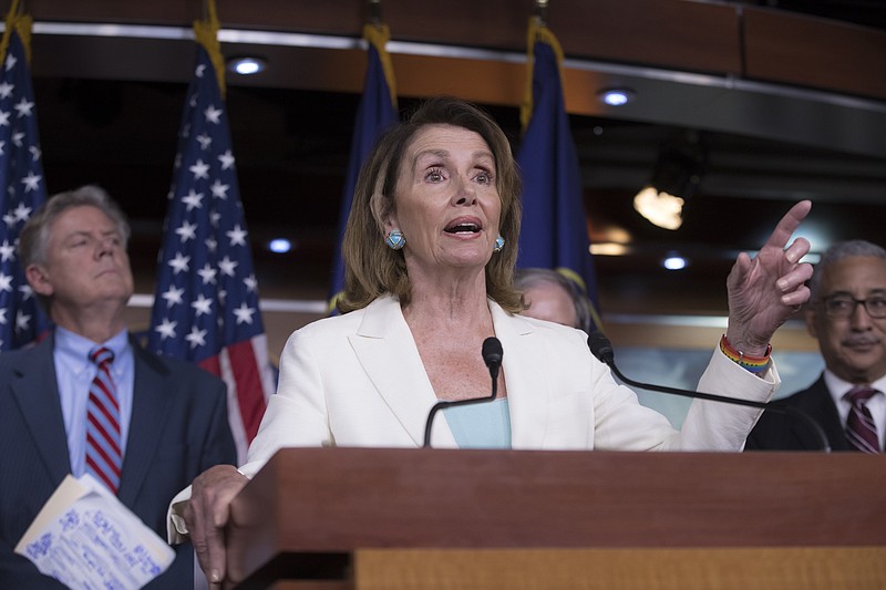 
              In this July 20, 2017 photo, House Minority Leader Nancy Pelosi, D-Calif., flanked by, Rep. Frank Pallone, D-N.J., the ranking member of the House Energy and Commerce Committee, left, and Rep. Bobby Scott, D-Va., the ranking member on the House Committee on Education and the Workforce, discusses the Republican efforts to replace "Obamacare," during a news conference on Capitol Hill in Washington.  Democrats are trying to bounce back from their November election losses and rebrand themselves, rolling out a populist new agenda under the slogan “A Better Deal.”   (AP Photo/J. Scott Applewhite)
            