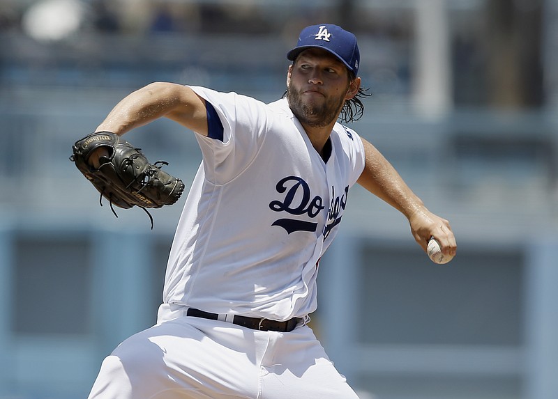 
              Los Angeles Dodgers starting pitcher Clayton Kershaw throws to the plate during the first inning of a baseball game against the Atlanta Braves in Los Angeles, Sunday, July 23, 2017. (AP Photo/Alex Gallardo)
            