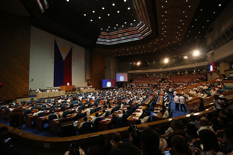 
              Philippine Speaker Pantaleon Alvarez talks during second Regular Session of the 17th Congress in suburban Quezon city, north of Manila, Philippines on Monday July 24, 2017. Philippine President Rodrigo Duterte is scheduled to make his second State of the Nation Address this afternoon. (AP Photo/Aaron Favila)
            
