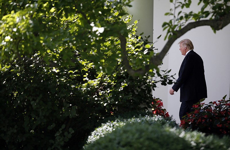 
              President Donald Trump walks from the Oval Office to the South Lawn of the White House in Washington, Monday July 24, 2017, before boarding Marine One for a short trip to Andrews Air Force Base, Md. then onto the 2017 National Scout Jamboree in West Virginia. (AP Photo/Alex Brandon)
            