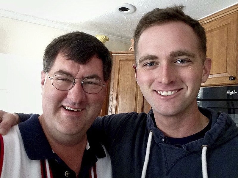 
              In this undated photo provided by David Taylor Sr., he poses with his son David Taylor, right, a former Marine. Taylor Sr. told The Associated Press on Tuesday, July 25, 2017, that he was notified by the U.S. State Department that his son was killed earlier this month in Syria while fighting for a Kurdish militia battling the Islamic State group. (Courtesy of David Taylor Sr. via AP)
            