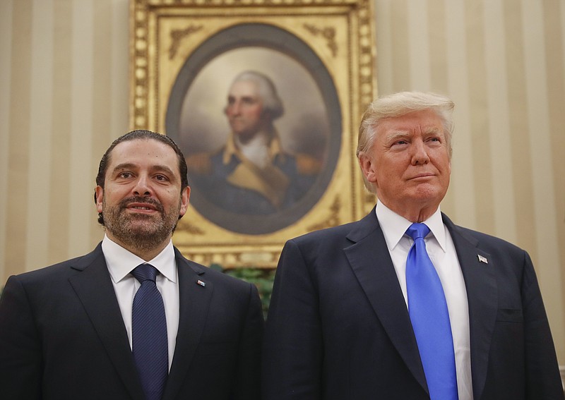 
              President Donald Trump meets with Lebanese Prime Minister Saad Hariri in the Oval Office of the White House in Washington, Tuesday, July 25, 2017. (AP Photo/Pablo Martinez Monsivais)
            