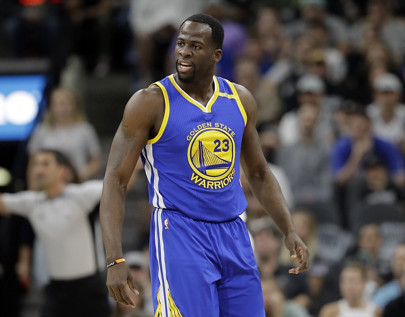 
              FILE - In this May 22, 2017, file photo, Golden State Warriors' Draymond Green reacts to play against the San Antonio Spurs during Game 4 of the NBA basketball Western Conference finals, in San Antonio. Green has been sued by a couple who claim the player and his entourage bullied them and physically assaulted them last year. (AP Photo/Eric Gay, File)
            