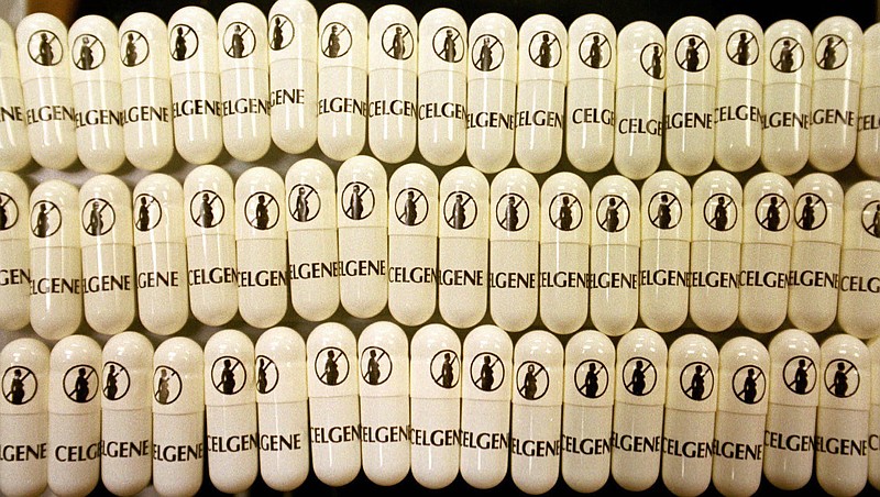 
              FILE - This April 7, 1998 file photo shows capsules of the drug thalidomide at the Celgene Corp. in Warren, N.J, printed with a symbol warning pregnant or soon-to-be pregnant women against use of the drug that had caused thousands of infant deformities. Celgene has agreed to pay $280 million to settle a federal lawsuit alleging it committed fraud by promoting a drug for leprosy and another therapy for unapproved cancer treatments, federal prosecutors announced Tuesday, July 25, 2017. (AP Photo/Mike Derer, File)
            