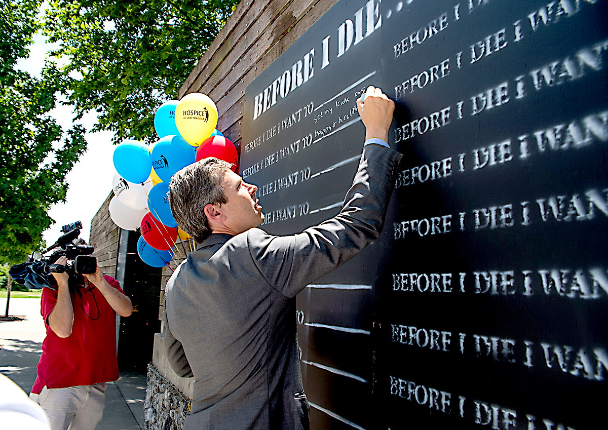 or Andy Burke writing on the Before I DIe Wall.