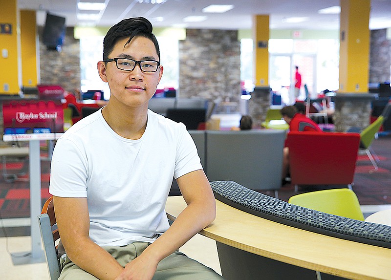 Patric Song poses for a photo in Frierson Student Center Thursday, May 25, 2017, at Baylor School in Chattanooga, Tenn. Song is a boarding student from China who has been attending Baylor for four years. 