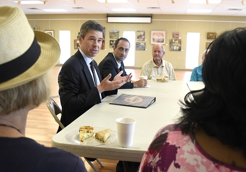 Maylor Andy Berke explains some of the issues seniors face about their property taxes, while Councilman Ken Smith looks on.  Mayor Andy Berke and District 3 Councilman Ken Smith heard from older citizens concerning the effect of property taxes on Seniors at the North River Civic Center on July 26, 2017.
